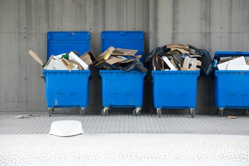 Workers sorting recyclable materials at a local transfer station